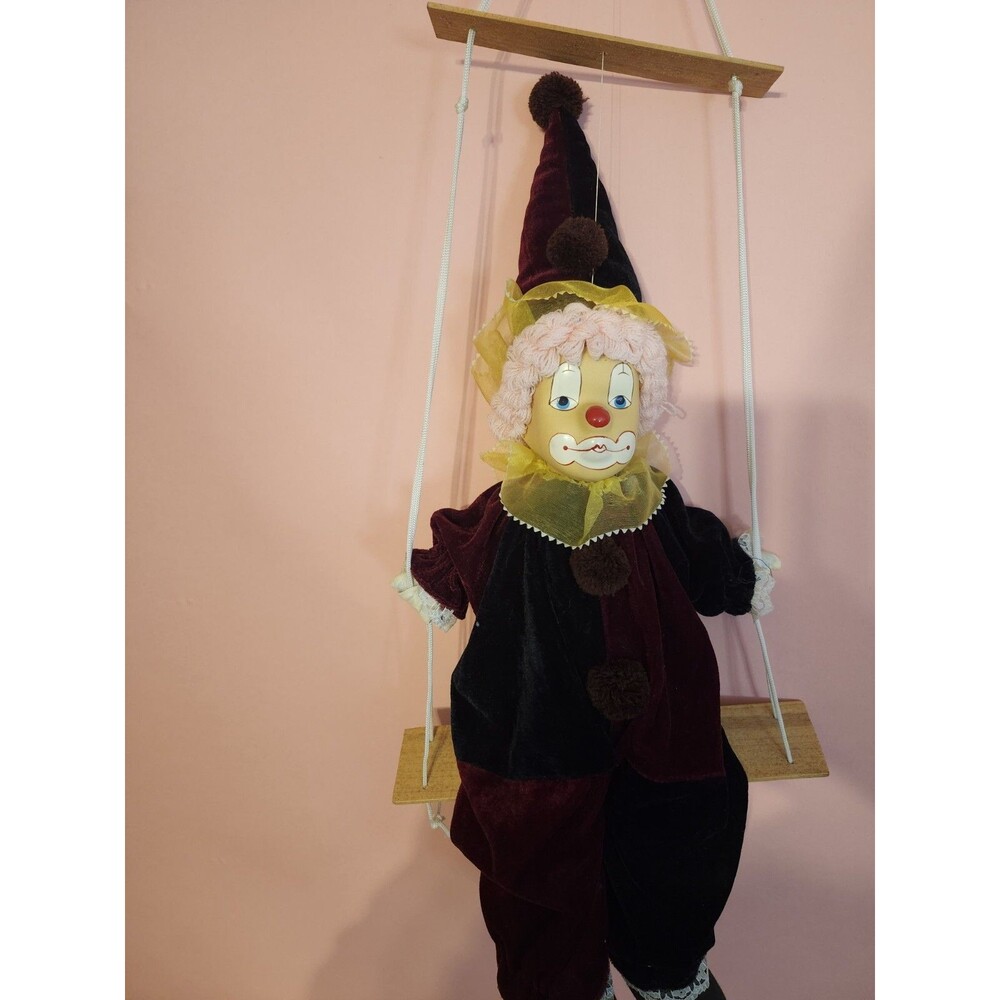 Vintage Clown Doll Sits On Wooden Swing Ceramic Head